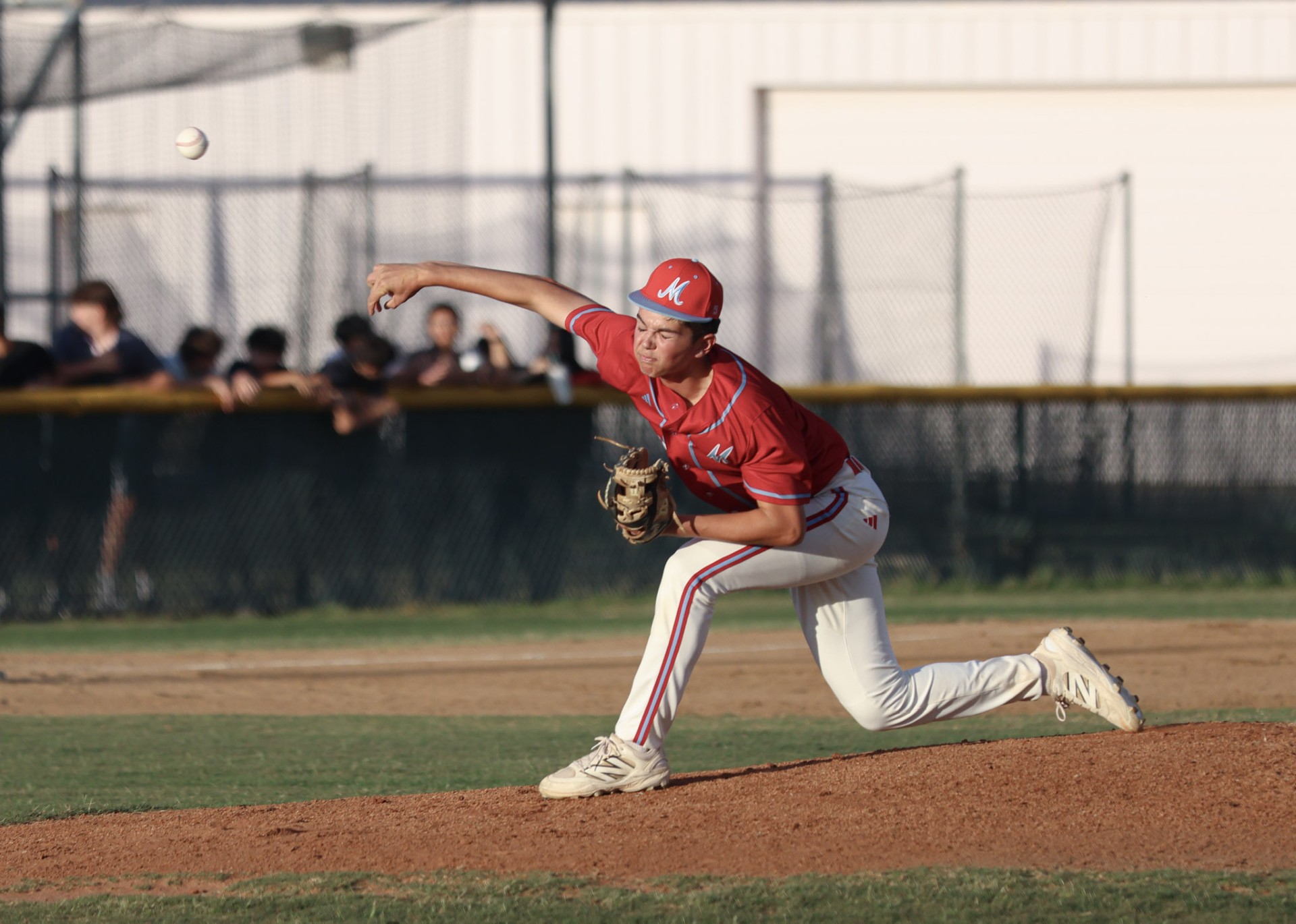 Pitcher delivering
