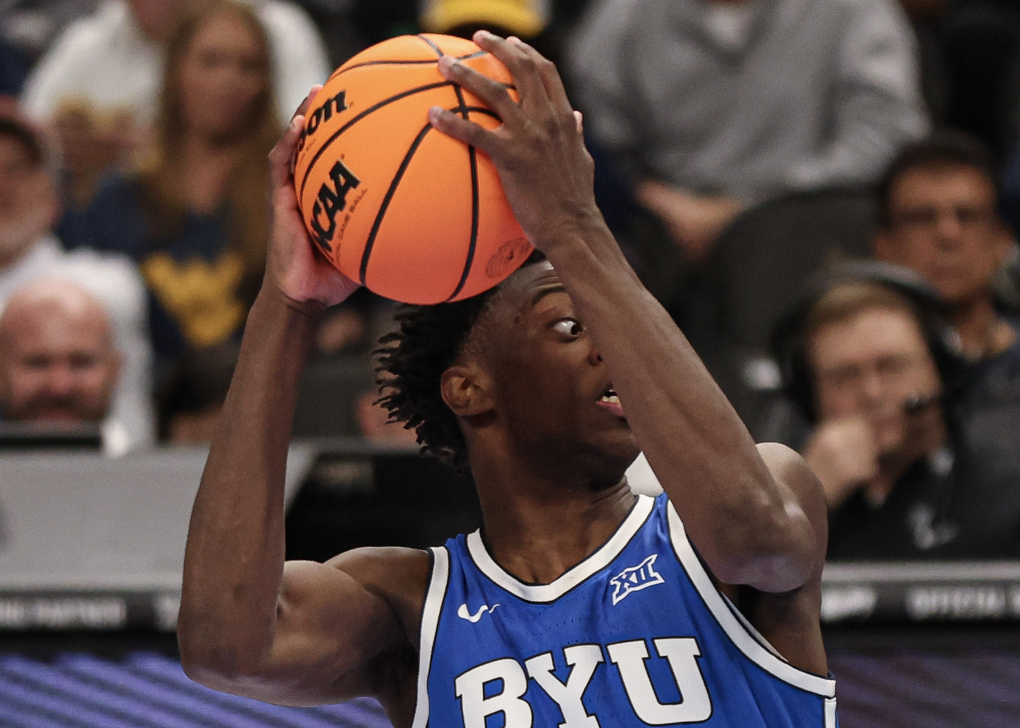 BYU player securing rebound